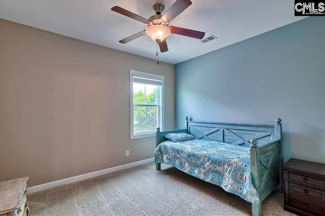 bedroom with ceiling fan and carpet flooring