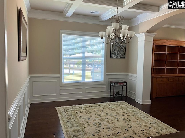 unfurnished dining area with beamed ceiling, ornamental molding, and coffered ceiling