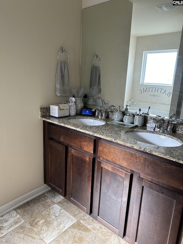 bathroom featuring vanity