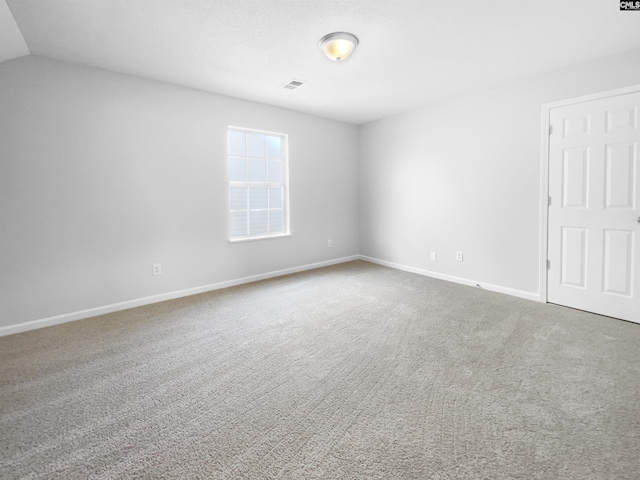 unfurnished room featuring carpet floors