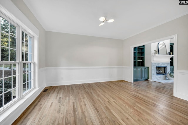 interior space with a fireplace and light wood-type flooring