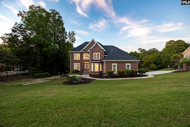 view of front of house with a front lawn