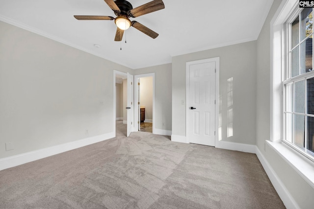 unfurnished bedroom with light carpet and ceiling fan