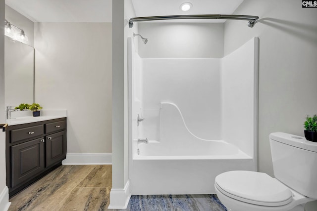 full bathroom featuring toilet, vanity, and shower / tub combination