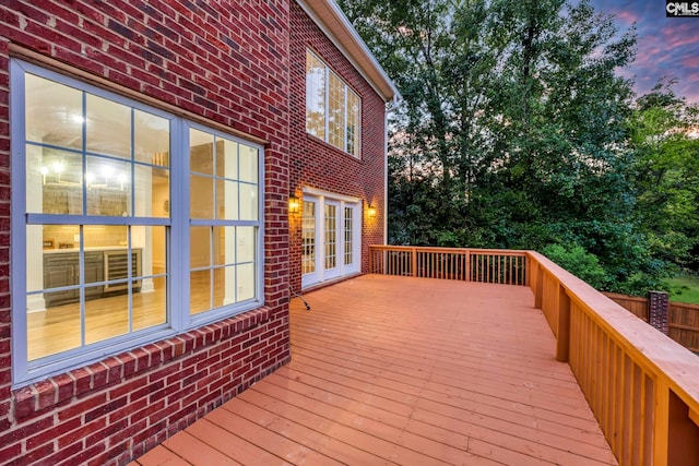 deck at dusk with french doors