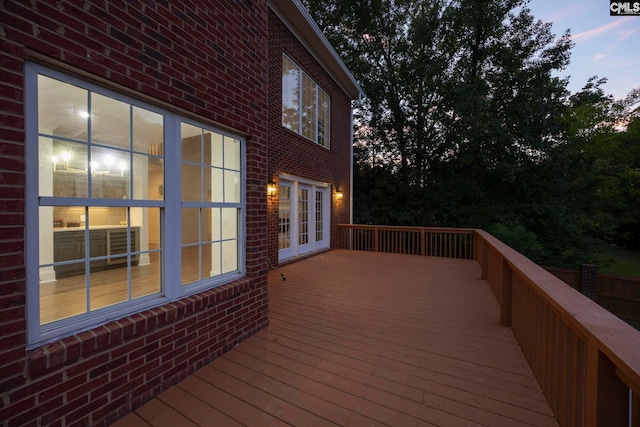 deck at dusk with french doors