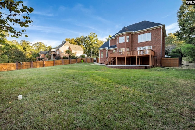 view of yard with a wooden deck