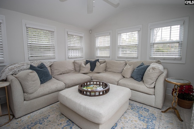 living room featuring lofted ceiling and ceiling fan