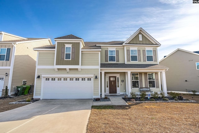 view of front of house with a garage and a porch