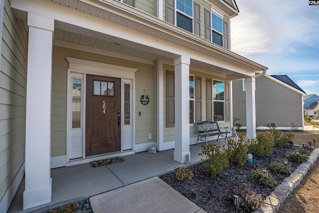 property entrance with a porch