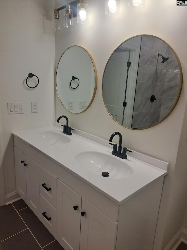 bathroom with tile patterned floors and vanity