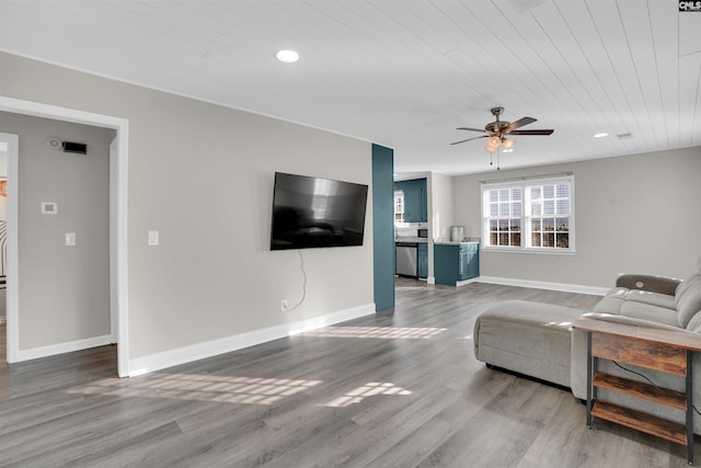 living room featuring ceiling fan, wood ceiling, and hardwood / wood-style floors