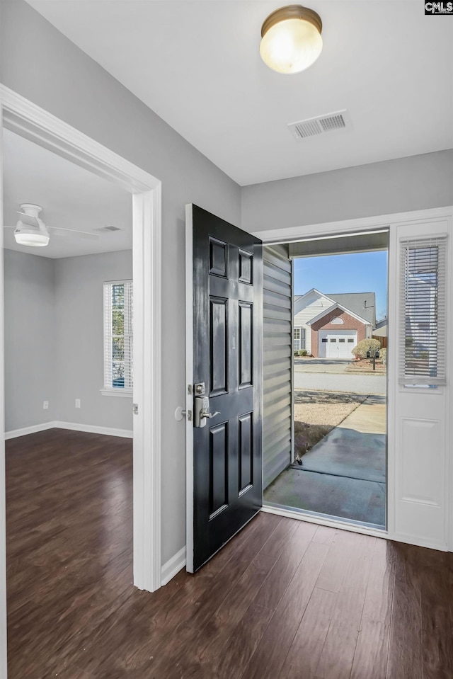 entryway featuring dark wood-type flooring