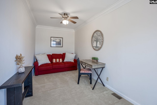 living area featuring carpet floors, ceiling fan, and ornamental molding