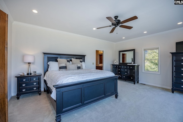 carpeted bedroom featuring ceiling fan and crown molding