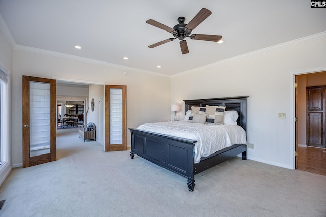 carpeted bedroom featuring ceiling fan, ornamental molding, and french doors