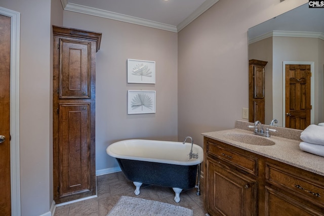 bathroom with vanity, tile patterned flooring, crown molding, and a tub