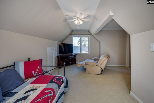 carpeted bedroom featuring vaulted ceiling and ceiling fan