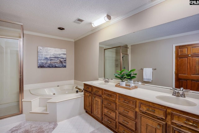 bathroom featuring a textured ceiling, vanity, crown molding, and independent shower and bath