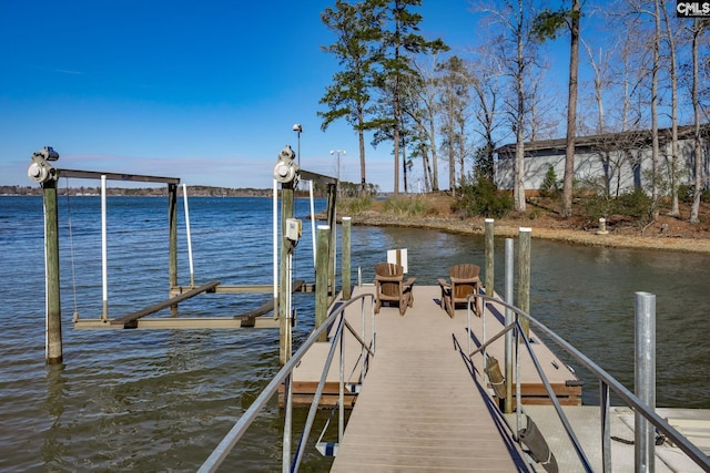 view of dock with a water view