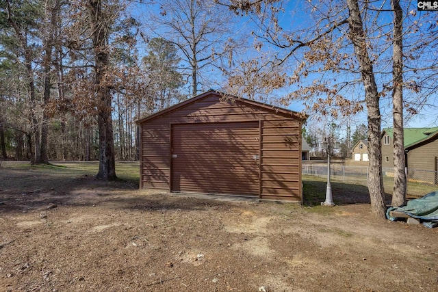 view of outbuilding featuring a garage