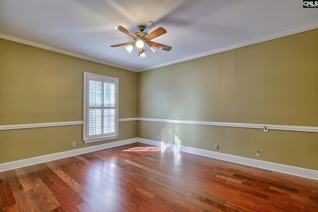 unfurnished room featuring crown molding, wood-type flooring, and ceiling fan