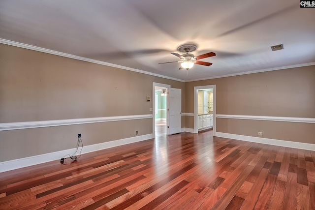 unfurnished room featuring hardwood / wood-style flooring, ceiling fan, and crown molding