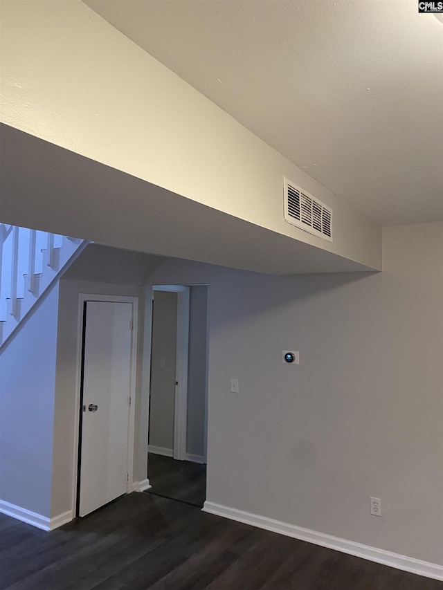 interior space with dark wood-type flooring