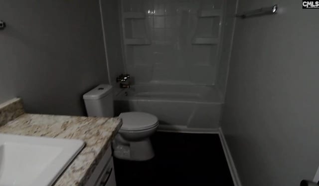 full bathroom with bathtub / shower combination, toilet, and vanity