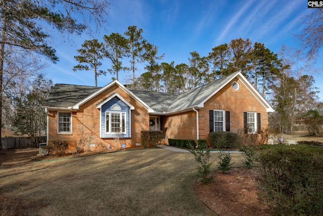 ranch-style home with a front yard