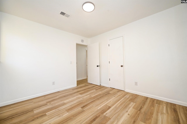 unfurnished bedroom with light hardwood / wood-style flooring