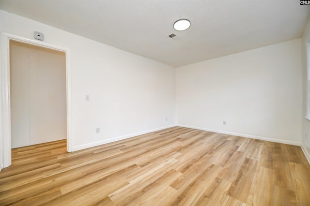 empty room featuring light wood-type flooring