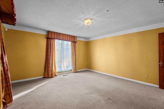 carpeted empty room with crown molding