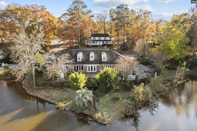 rear view of property featuring a water view