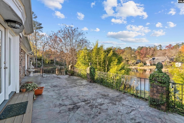 view of patio / terrace featuring a water view