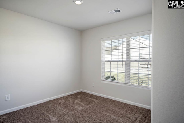 view of carpeted spare room