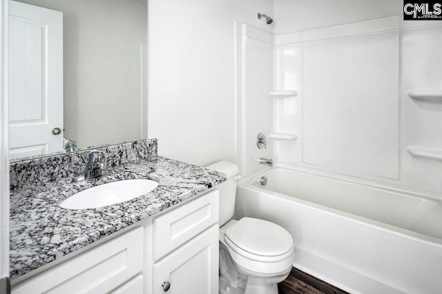 full bathroom with shower / bathtub combination, toilet, and vanity