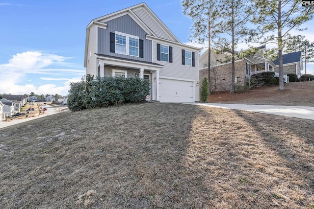 traditional-style house with board and batten siding, a residential view, concrete driveway, and an attached garage