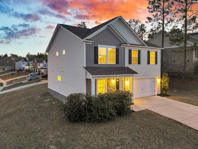 property exterior at dusk with a garage