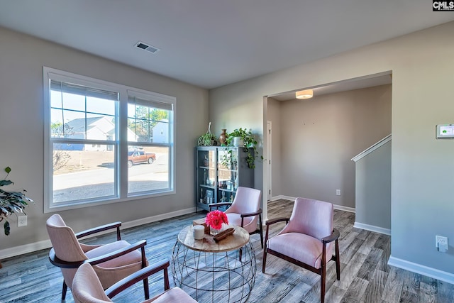 living area featuring hardwood / wood-style floors