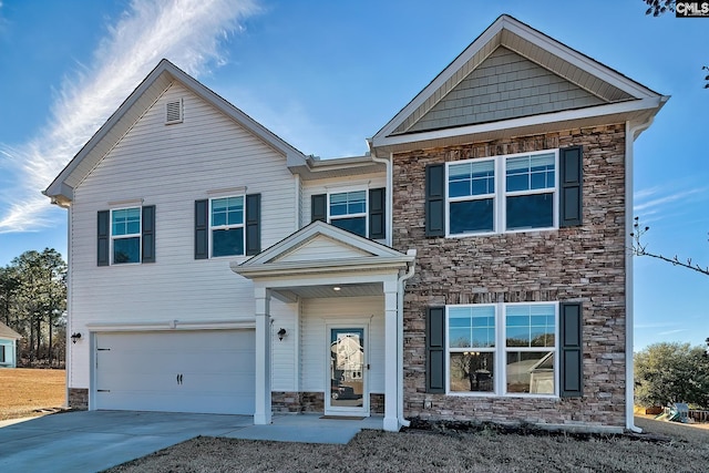 view of front of home with a garage