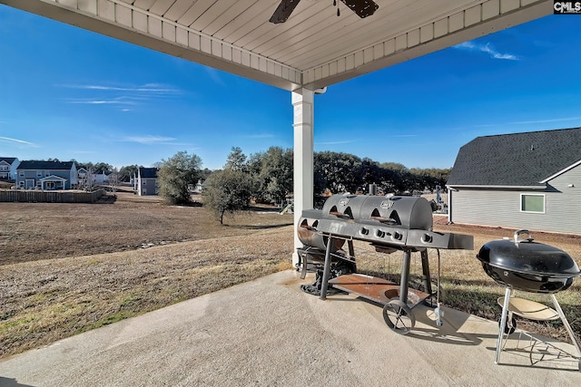 view of patio / terrace featuring ceiling fan and grilling area