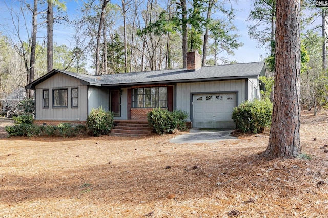 ranch-style house featuring a garage