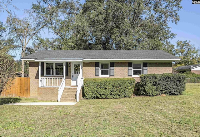 view of front of property featuring a front yard