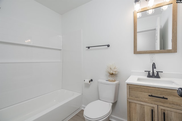 full bathroom featuring shower / bath combination, toilet, and vanity