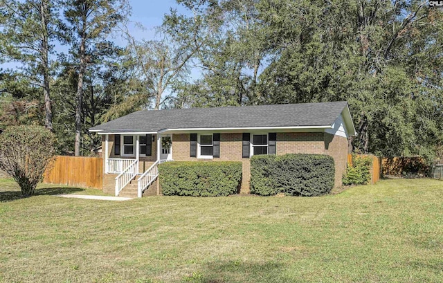 view of front facade featuring a front yard