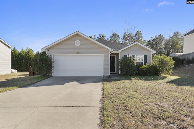 ranch-style house featuring a garage and a front lawn