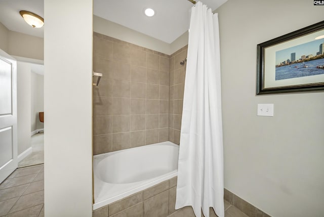 bathroom with tile patterned floors and shower / bathtub combination with curtain