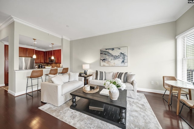 living room with dark wood-type flooring and ornamental molding