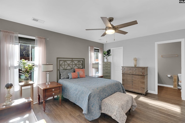 bedroom with ceiling fan and wood-type flooring